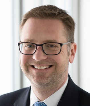 male in suit headshot
