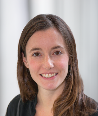 Headshot of female with brown hair smiling